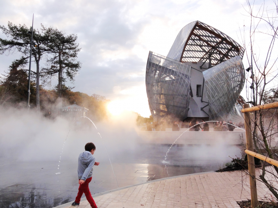 kid 's playing with the sun